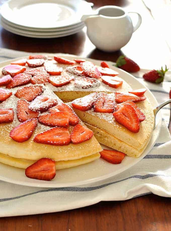 A slice of giant pancake being served