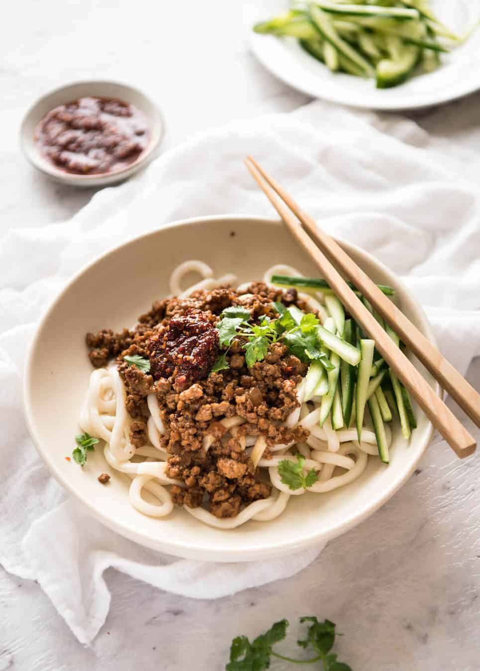 Chinese Pork with Noodles (Zha Jiang Mian) - Super quick and super tasty, affectionally known as "Chinese Bolognese". The pork is savoury with a touch of heat and spice, perfect mixed through noodles! www.recipetineats.com