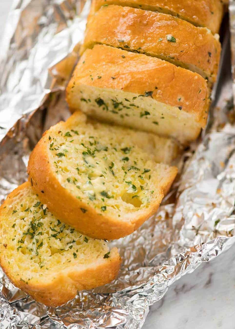 Better than Pizza Hut! For a truly religious Garlic Bread experience, skip the artisan bread and use a basic French stick. And no skimping on butter! www.recipetineats.com