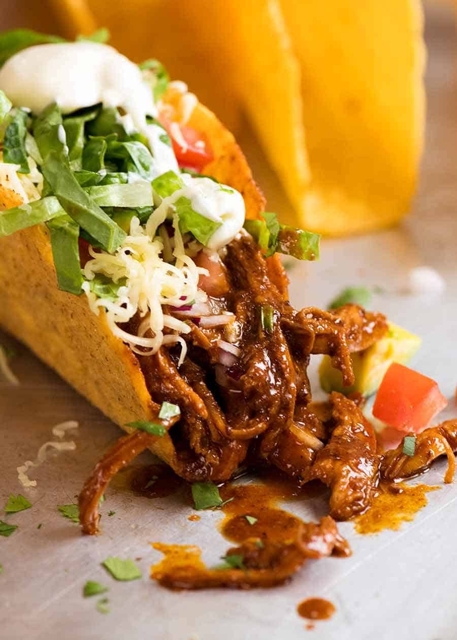 Crisp corn taco shell stuffed with juicy Chicken taco filling