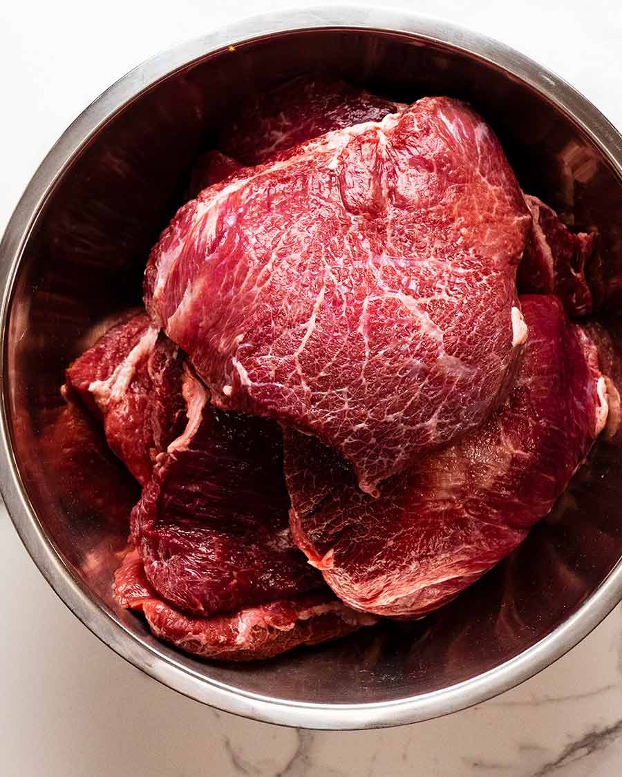 Raw beef cheeks in a bowl